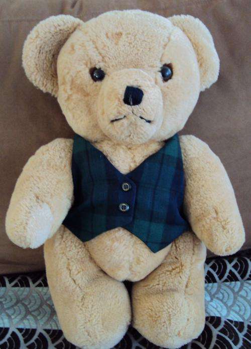 Vintage jointed teddy in a new spiffy tartan waistcoat
