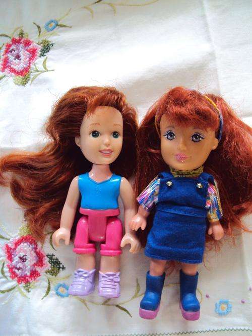 Kid Kore doll and a 1997 GTI doll both with longggg lush hair