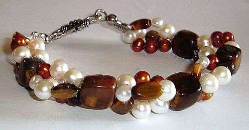 MARYKAY COLLECTION - STRIKING 3 STRAND FRESHWATER PEARL & TIGERS EYE BRACELET
