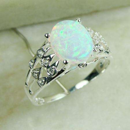 MARYKAY - GORGEOUS WHITE FIRE OPAL RING SET IN STERLING SILVER
