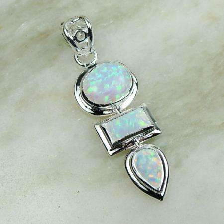 MARYKAY - GORGEOUS WHITE FIRE OPAL PENDANT SET IN STERLING SILVER