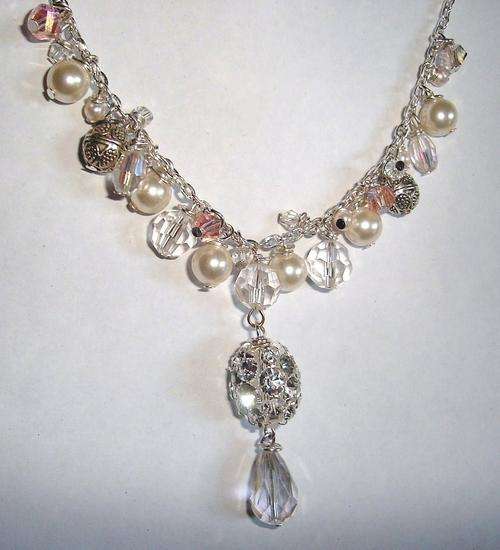 MARYKAY  - GENUINE SWAROVSKI PEARL, CRYSTAL AND CHARM NECKLACE