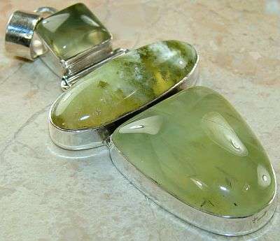MARYKAY - FANCY MOSS PREHNITE GEMSTONE PENDANT IN .925 STERLING SILVER