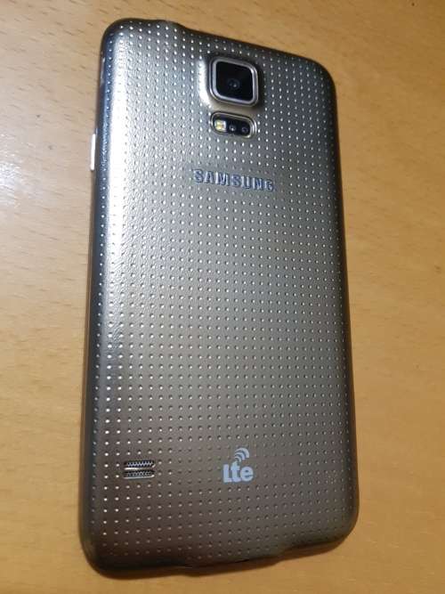Samsung S5 Gold with additional 7800mAh extra long life battery