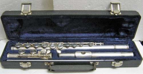 "SWALLOW" FLUTE WITH CASE AND SEEMS TO BE IN GOOD CONDITION - SERVICE RECEIPT FOR 2003 IN P.E.