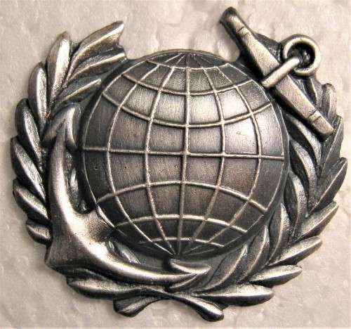 OLD S.A. NAVY MARINES BREAST BADGE WITH PINS AND CAPS IN AN UNUSED CONDITION