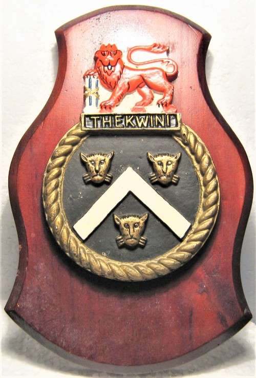 OLD S.A. NAVY METAL PAINTED "SAS THEKWINI" (OLD DURBAN) BADGE, MOUNTED IN GOOD CONDITION