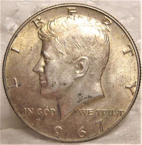 1967 SILVER KENNEDY HALF DOLLAR IN A GOOD CIRCULATED CONDITION