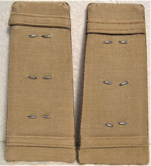 OLD S.A.D.F. ARMY CAPTAINS SLIP ON SHOULDER BOARDS WITH SMALL CHROMED STARS IN A GOOD USED CONDTION