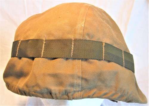 OLD SADF NUTRIA HELMET COVER SIZE LARGE WITH A FEW SCRATCHES ON THE TOP OTHERWISE GOOD CONDITION