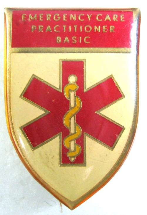 EMERGENCY CARE PRACTITIONER  BASIC BREAST BADGE IN GOOD USED CONDITION