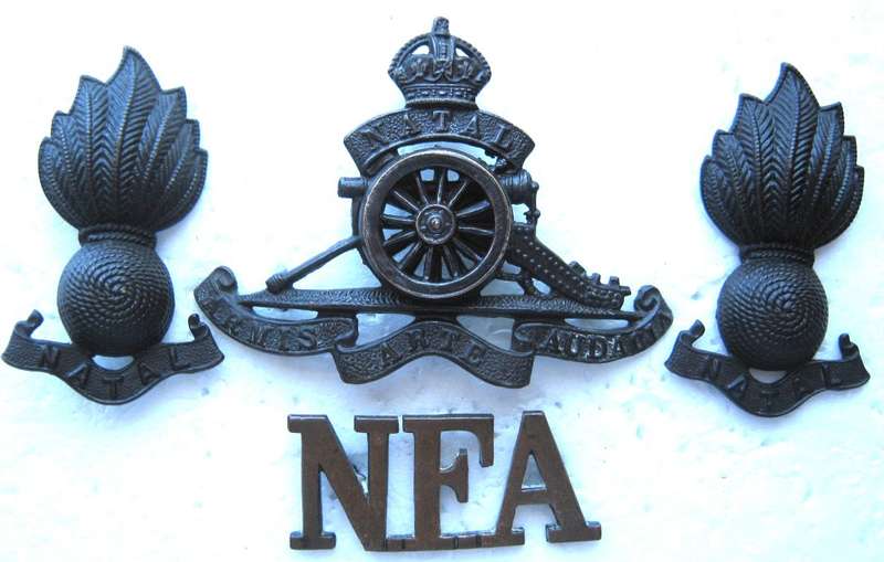 OLD NATAL FIELD ARTILLERY SET - CAP AND COLLAR BADGES AND ONE SHOULDER TITLE WITH LUGS