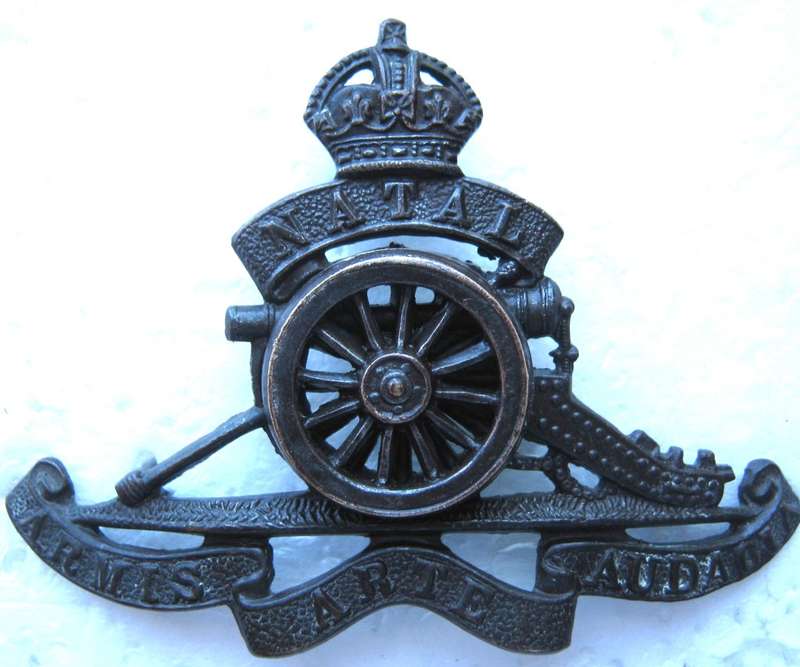 OLD NATAL FIELD ARTILLERY SET - CAP AND COLLAR BADGES AND ONE SHOULDER TITLE WITH LUGS