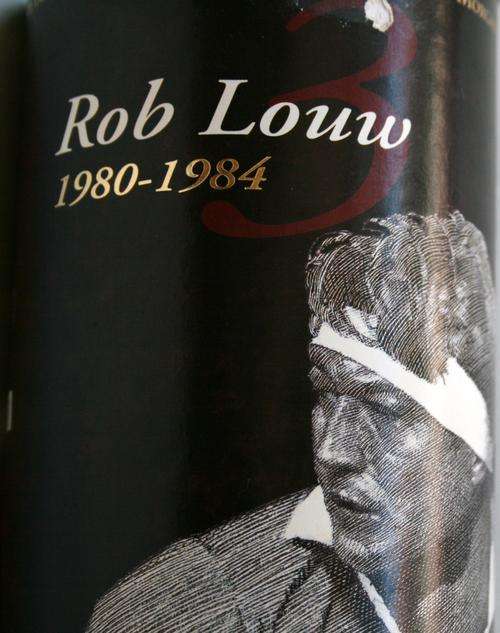 CAPTAIN MORGAN TIN WITH PHOTO & WRITE UP ON ROB LOUW GIVING HISTORY ETC ON HIM