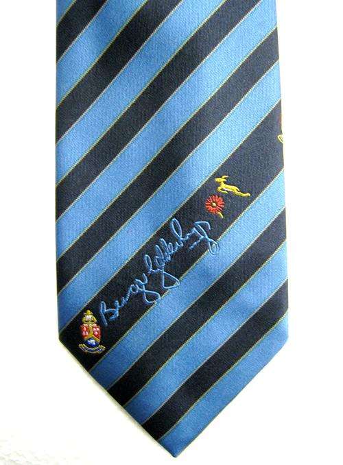 BURGER GELDENHUYS SIGNATURE RUGBY TIE IN GOOD CONDITION