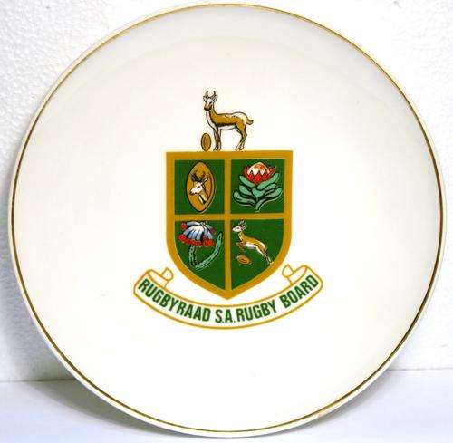 SIDE PLATE WITH THE OLD S.A. RUGBY BOARD EMBLEM ON IT IN GOOD CONDITION