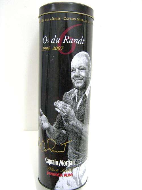 CAPTAIN MORGAN TIN WITH PHOTO & WRITE UP ON OS DU RAND, GIVING HISTORY ETC ON HIM
