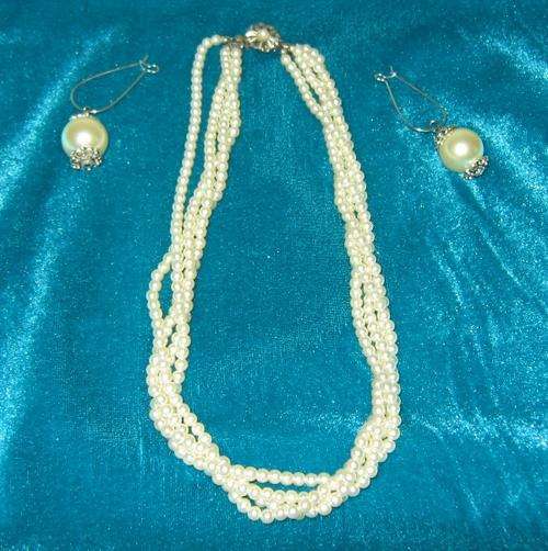 Lovely 4 strand Pearl necklace and earrings