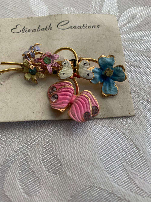 Vintage Metal brooch with flowers and butterfly