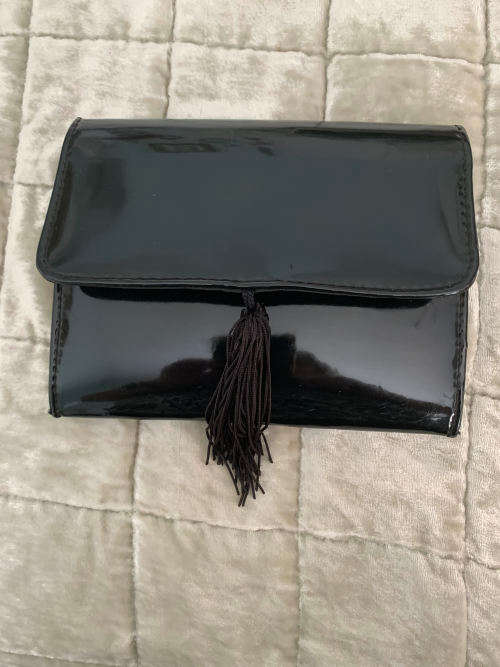 Patent bag with tassel