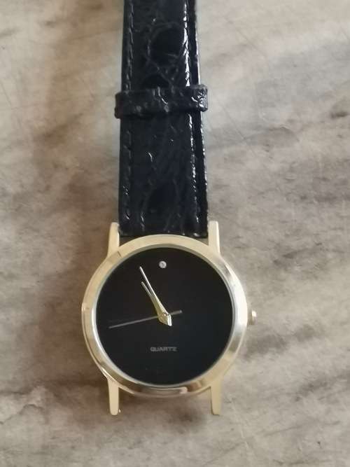 BEAUTIFUL GOLD PLATED BLACK LADIES WATCH WITH REAL DIAMOND