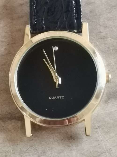 BEAUTIFUL GOLD PLATED BLACK LADIES WATCH WITH REAL DIAMOND