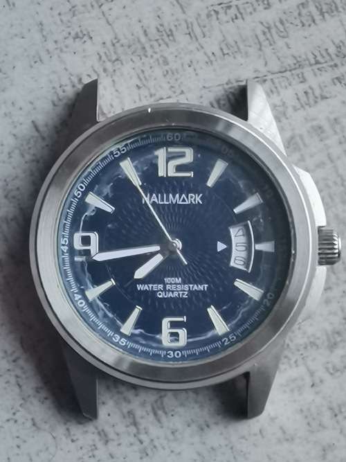 HALLMARK MENS QUARTZ WATCH IN EXCELLENT WORKING CONDITION - NO STRAP
