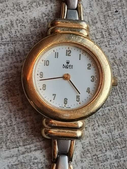 LADIES VINTAGE SWISS BUREN WATCH IN EXCL WORKING CONDITION VALUED @ R3500 WITH VALUATION CERTIFICATE