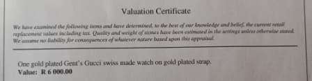 MENS GOLD PLATED SWISS MADE GUCCI WATCH VALUED @ R6000 IN EXCELLENT WORKING CONDITION