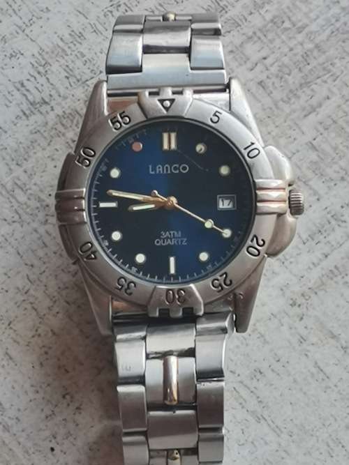 MENS LANCO WATCH WITH ROTATING BEZEL IN EXCELLENT WORKING CONDITION
