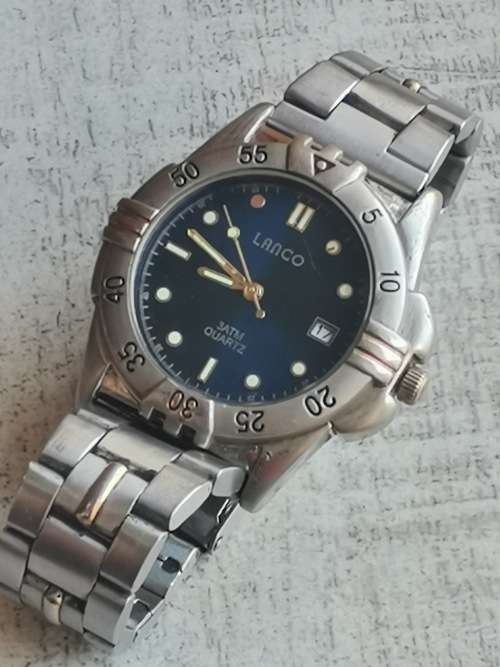 MENS LANCO WATCH WITH ROTATING BEZEL IN EXCELLENT WORKING CONDITION