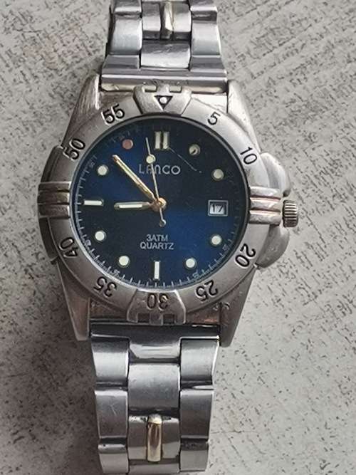 MENS LANCO WATCH WITH ROTATING BEZEL IN EXCELLENT WORKING CONDITION