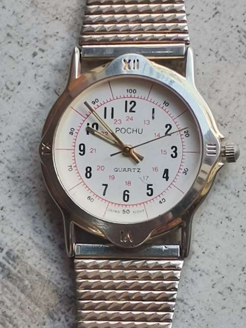 POCHU MENS QUARTZ WATCH IN EXCELLENT WORKING CONDITION