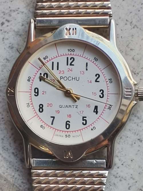 POCHU MENS QUARTZ WATCH IN EXCELLENT WORKING CONDITION