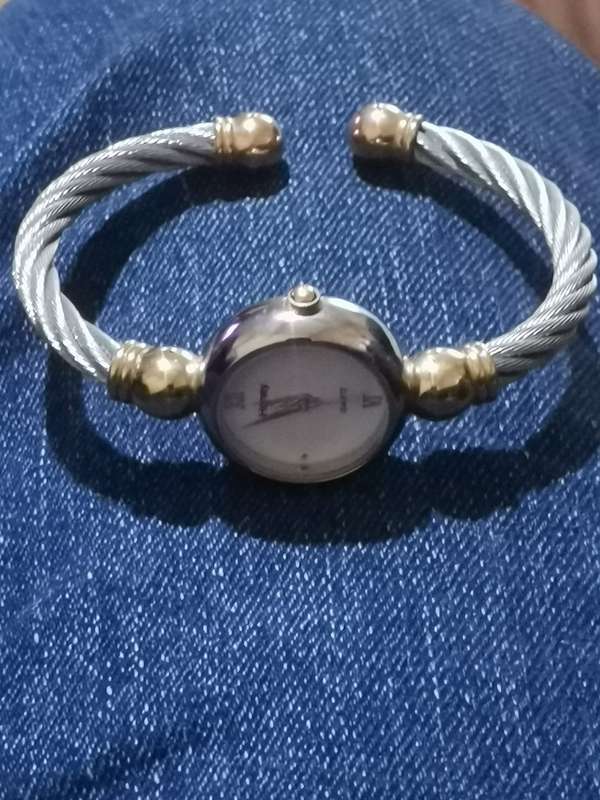 UNIQUE AND STUNNING HONEY LADIES BANGLE WATCH IN EXCELLENT WORKING CONDITION