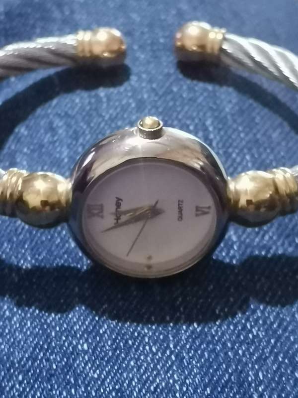 UNIQUE AND STUNNING HONEY LADIES BANGLE WATCH IN EXCELLENT WORKING CONDITION