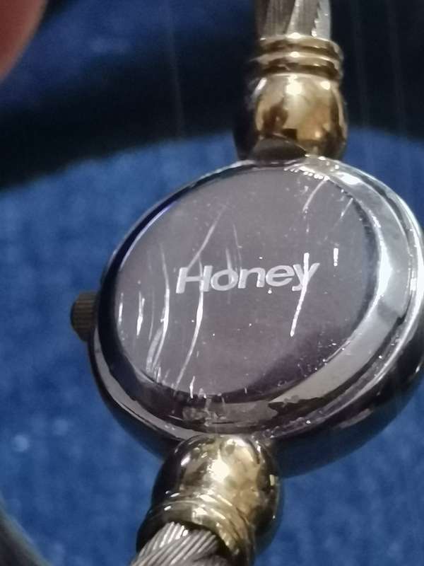 UNIQUE AND STUNNING HONEY LADIES BANGLE WATCH IN EXCELLENT WORKING CONDITION