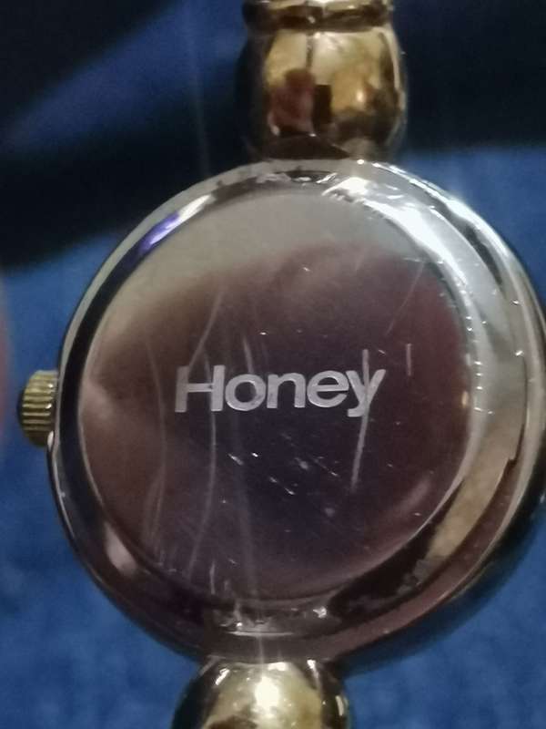 UNIQUE AND STUNNING HONEY LADIES BANGLE WATCH IN EXCELLENT WORKING CONDITION
