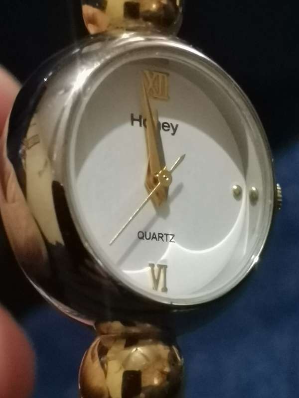 UNIQUE AND STUNNING HONEY LADIES BANGLE WATCH IN EXCELLENT WORKING CONDITION
