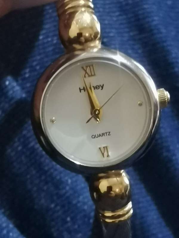 UNIQUE AND STUNNING HONEY LADIES BANGLE WATCH IN EXCELLENT WORKING CONDITION