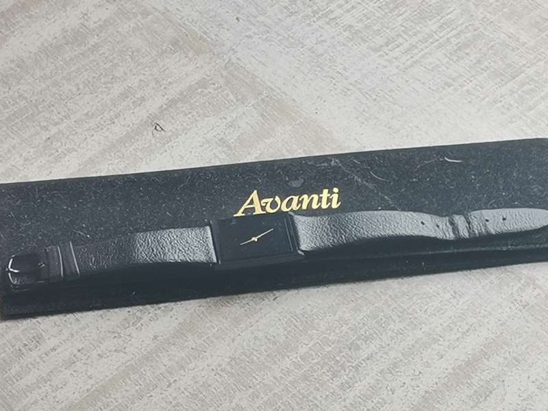 AVANTI ALL BLACK QUARTZ WATCH WITH ORIGINAL DISPLAY CASE IN EXCELLENT WORKING CONDITION