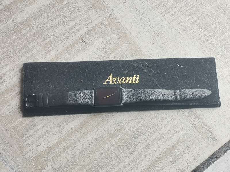 AVANTI ALL BLACK QUARTZ WATCH WITH ORIGINAL DISPLAY CASE IN EXCELLENT WORKING CONDITION