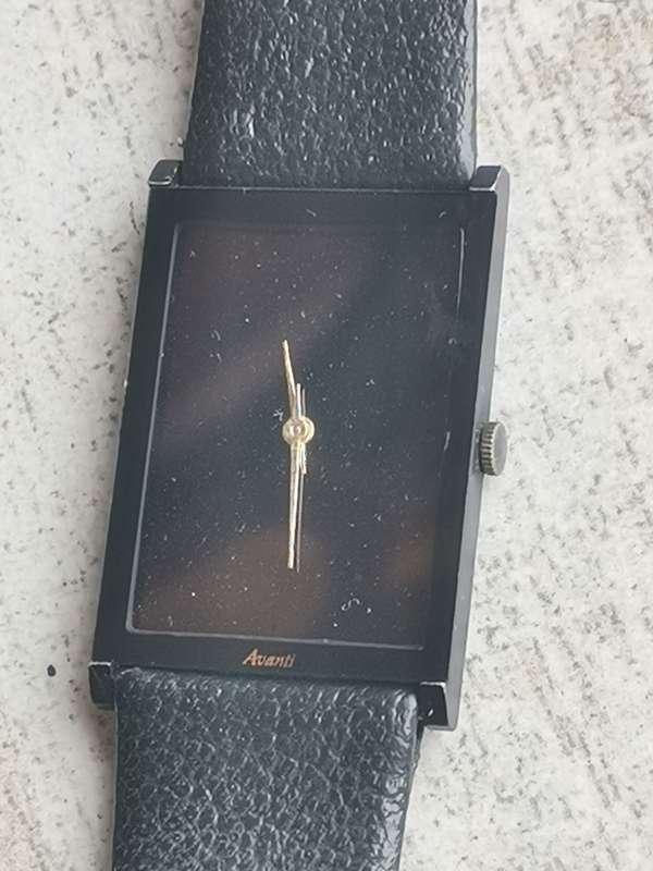 AVANTI ALL BLACK QUARTZ WATCH WITH ORIGINAL DISPLAY CASE IN EXCELLENT WORKING CONDITION