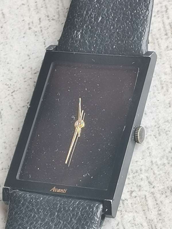 AVANTI ALL BLACK QUARTZ WATCH WITH ORIGINAL DISPLAY CASE IN EXCELLENT WORKING CONDITION