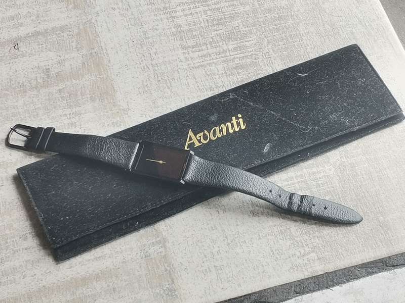AVANTI ALL BLACK QUARTZ WATCH WITH ORIGINAL DISPLAY CASE IN EXCELLENT WORKING CONDITION