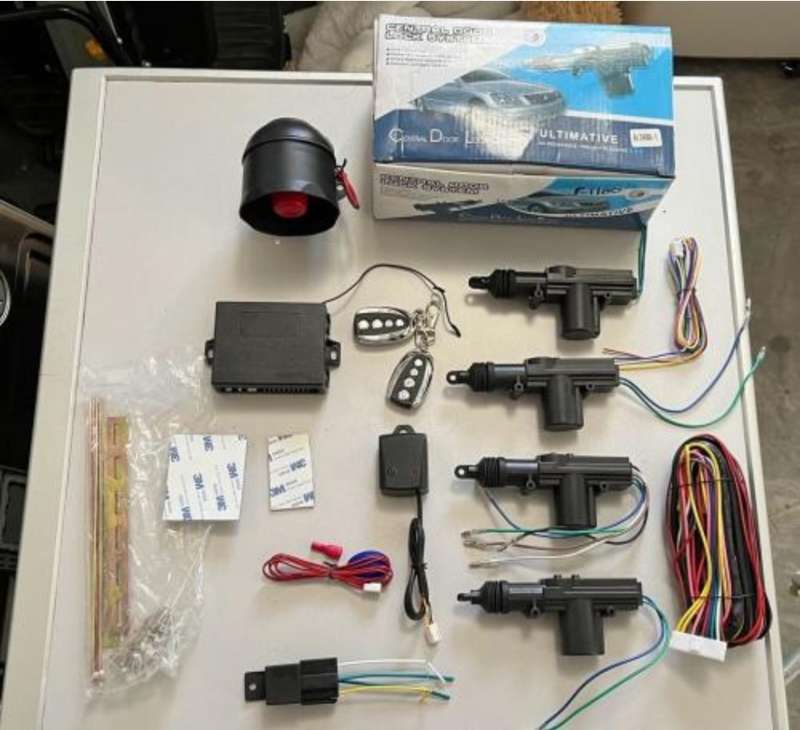 CAR ALARM AND CENTRAL LOCKING SYSTEM WITH MANUALS NEW IN BOX