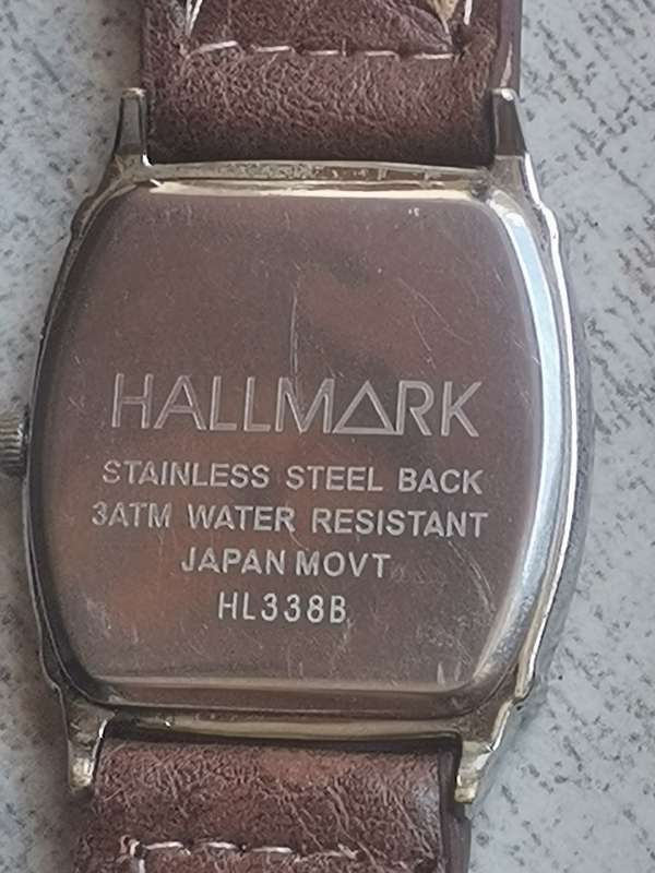 HALLMARK MENS QUARTZ WATCH IN EXCELLENT WORKING CONDITION