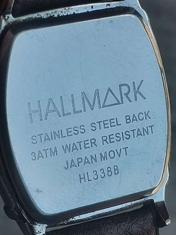HALLMARK MENS QUARTZ WATCH IN EXCELLENT WORKING CONDITION