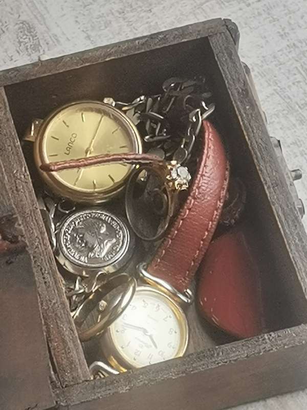 SMALL WOODEN TREASURE CHEST WITH SOME JEWELLERY AND WATCHES