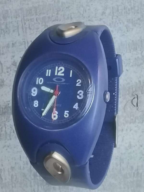OAKLEY MENS WATCH IN EXCELLENT WORKING CONDITION